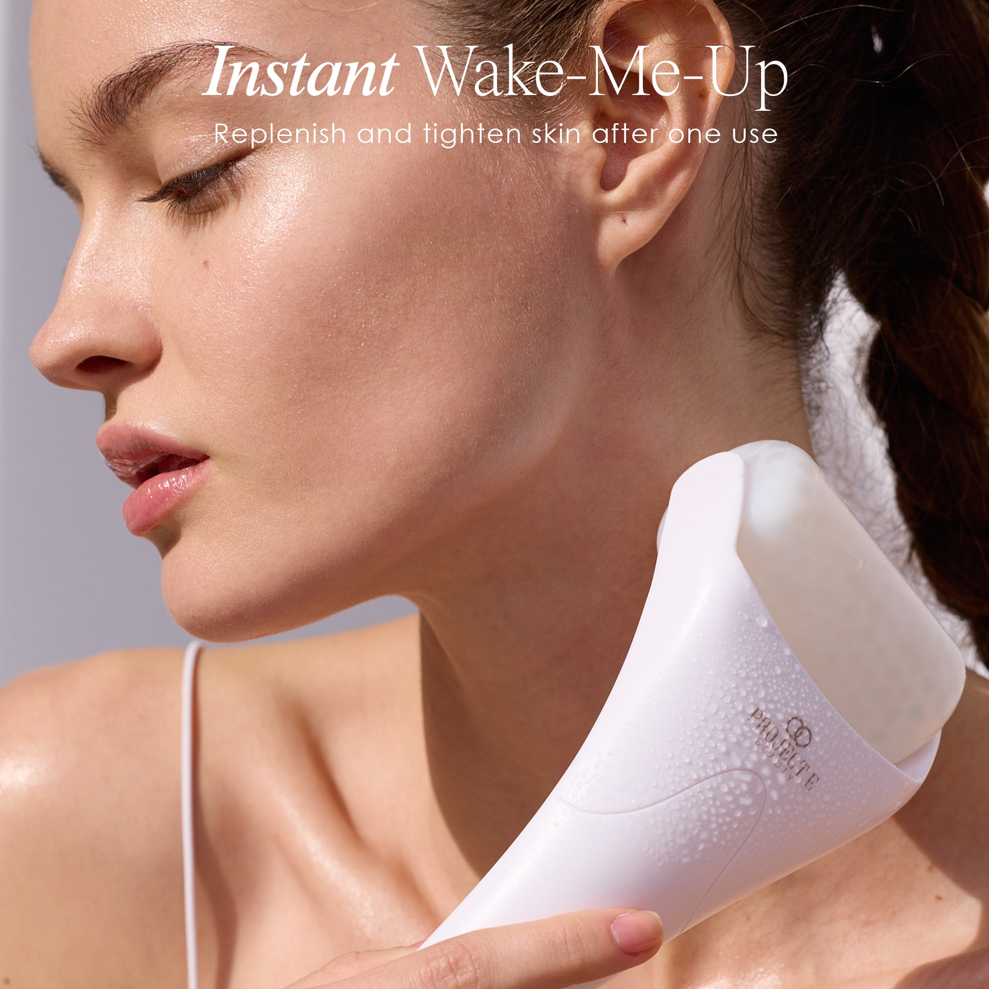 The Ice Roller facial massager showing a model using the cryotherapy tool