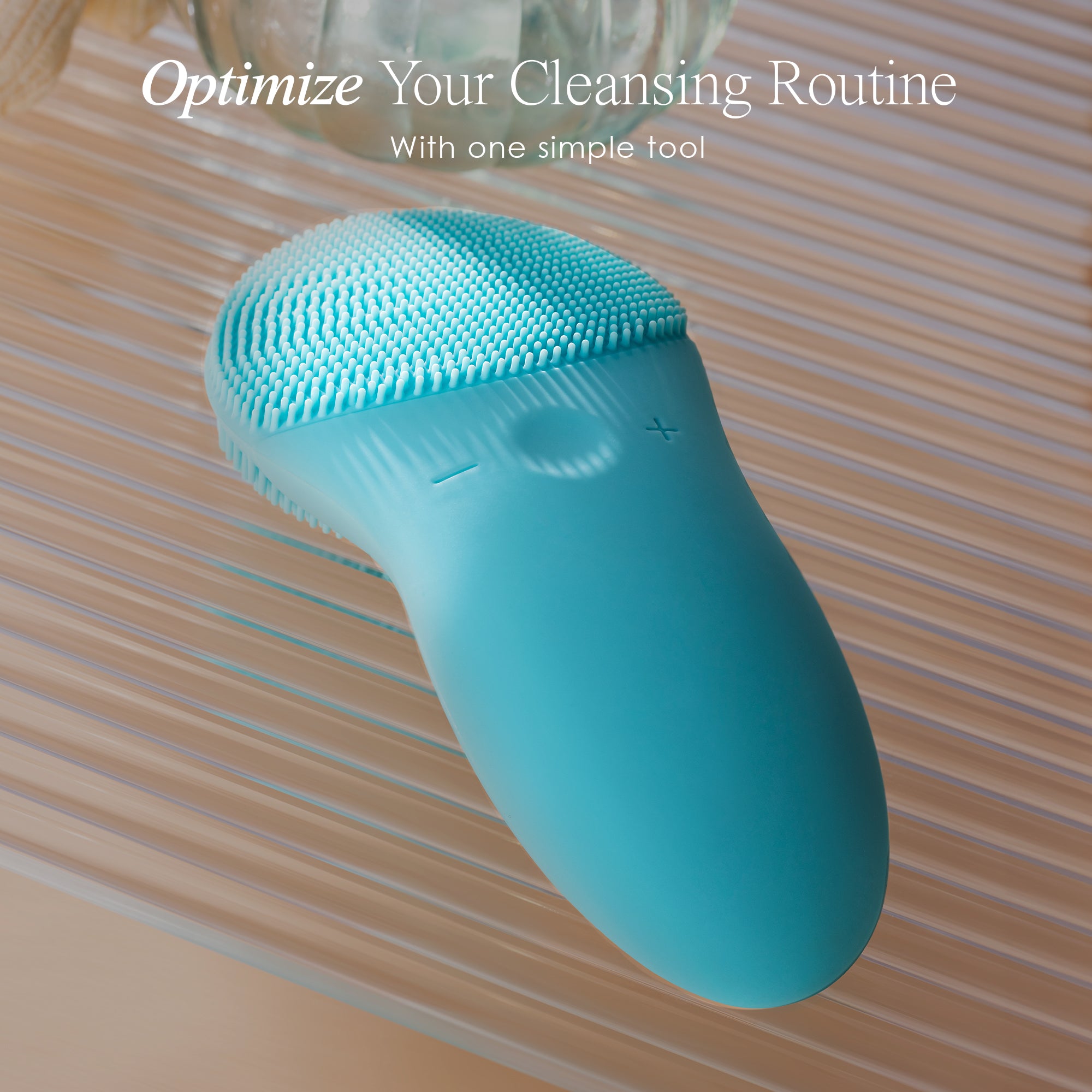 CLEO+ sonic facial cleansing brush showing the electric facial brush